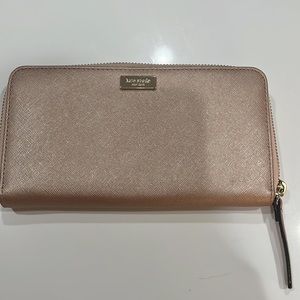 Kate Spade rose gold wallet.  Like new!!